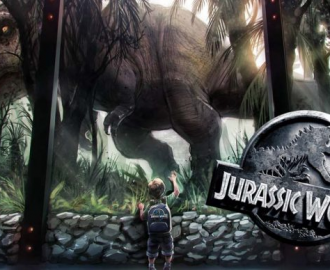 Dreng der kigger på dinosaur Jurassic World spilleautomat