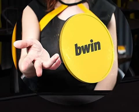 Bwin gul mønt ved kvindehånd